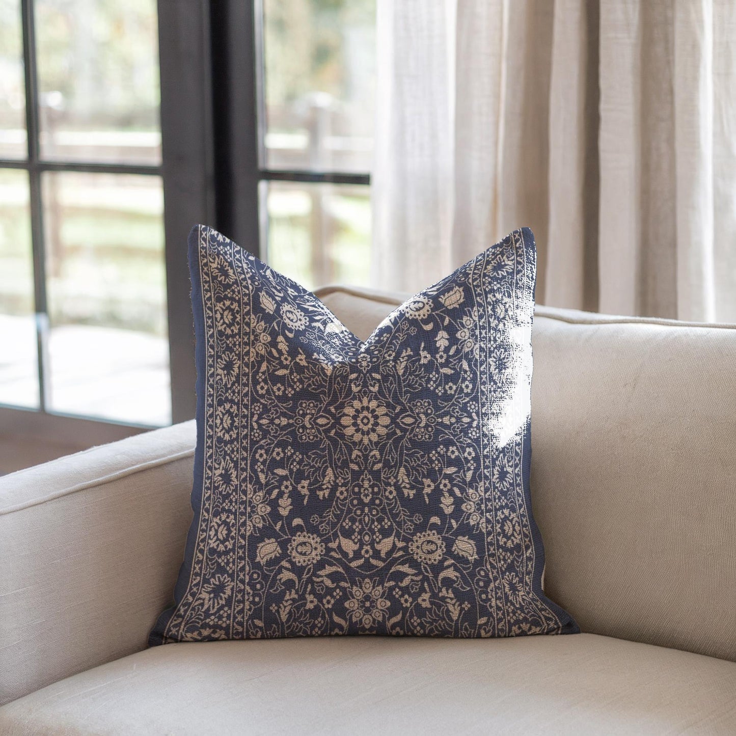 Moroccan Inspired throw pillow with floral pattern styled on a sofa or bed
