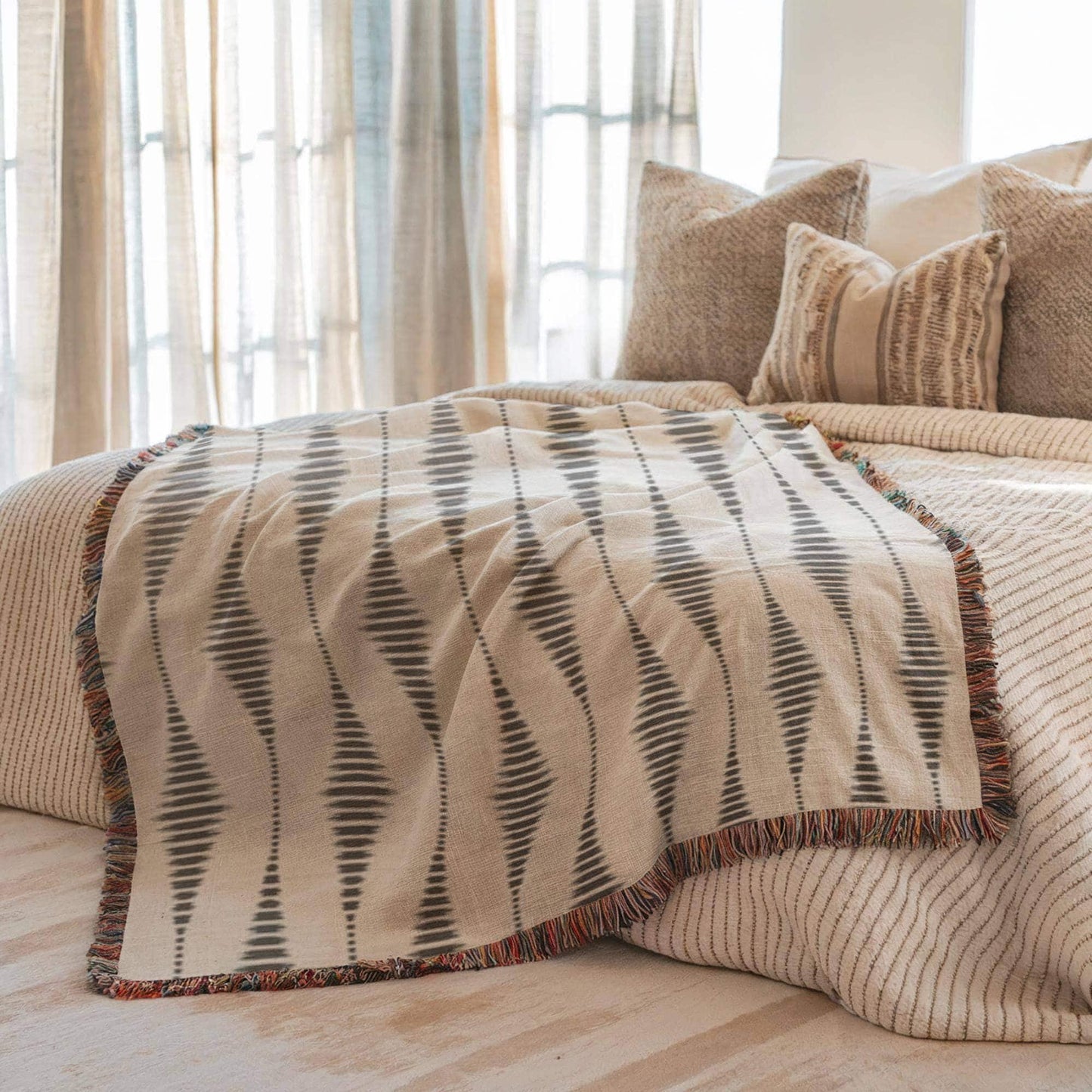 Modern Geometric woven blanket with geometric pattern styled for layered home decor