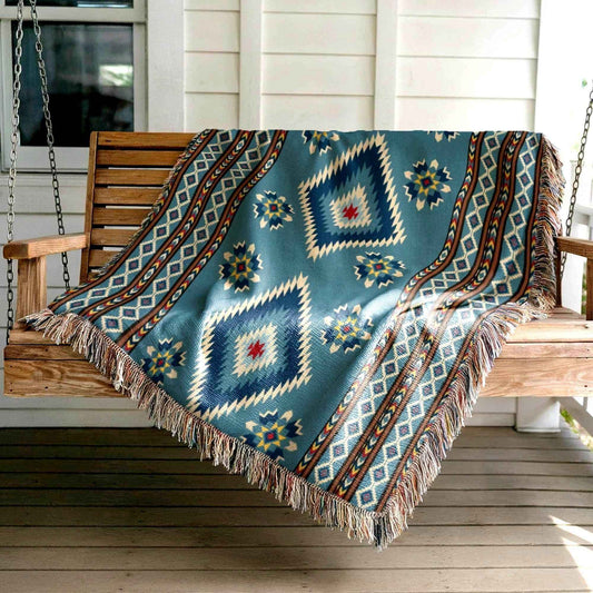 Southwestern outdoor woven throw blanket with geometric pattern for patio styling