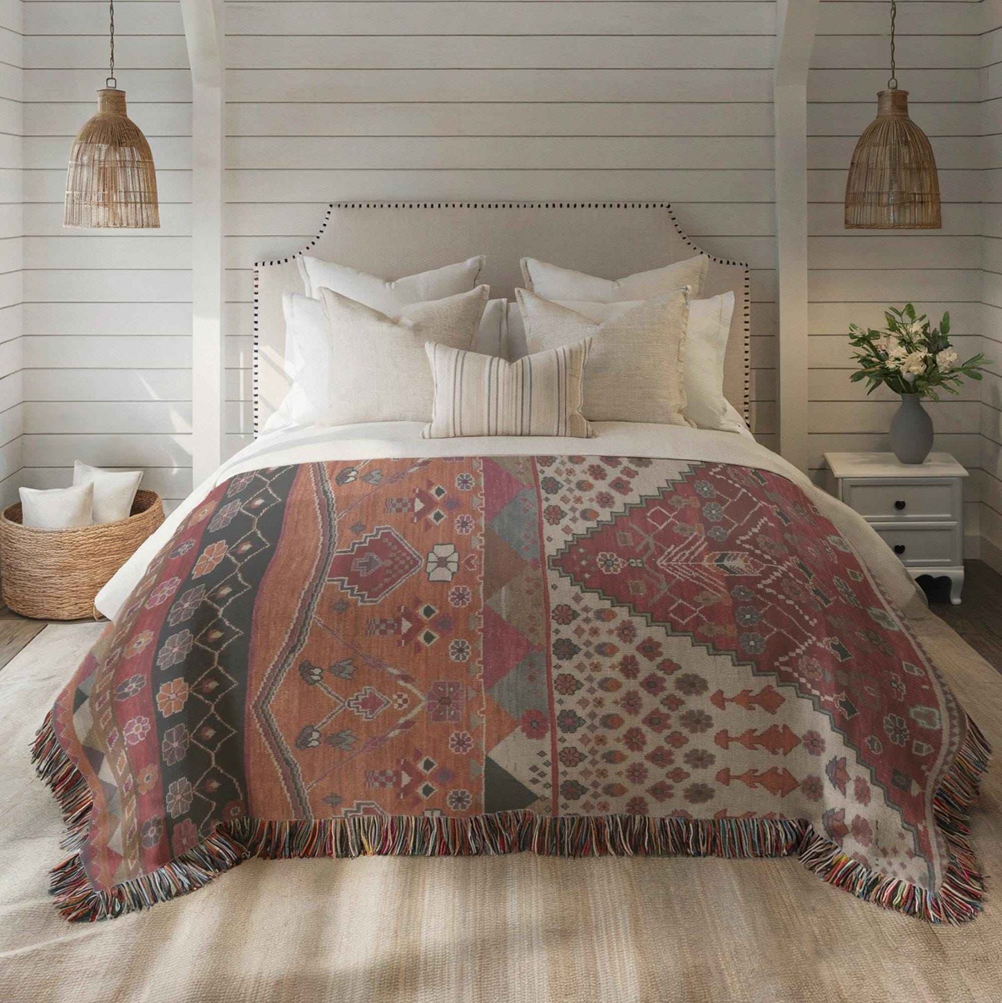 Southwestern woven blanket with geometric pattern styled for layered home decor