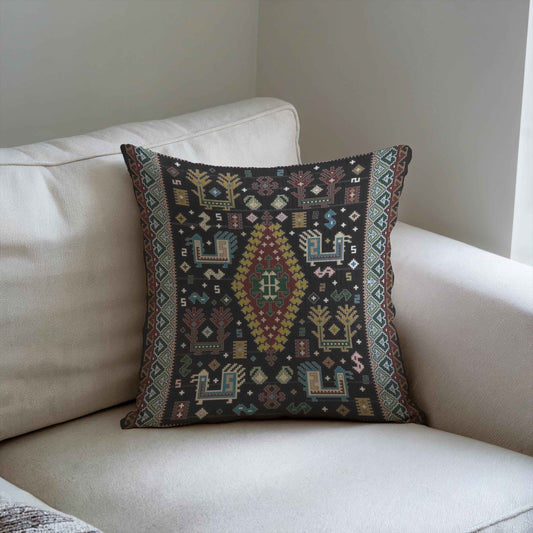 Southwestern throw pillow with geometric pattern styled on a sofa or bed