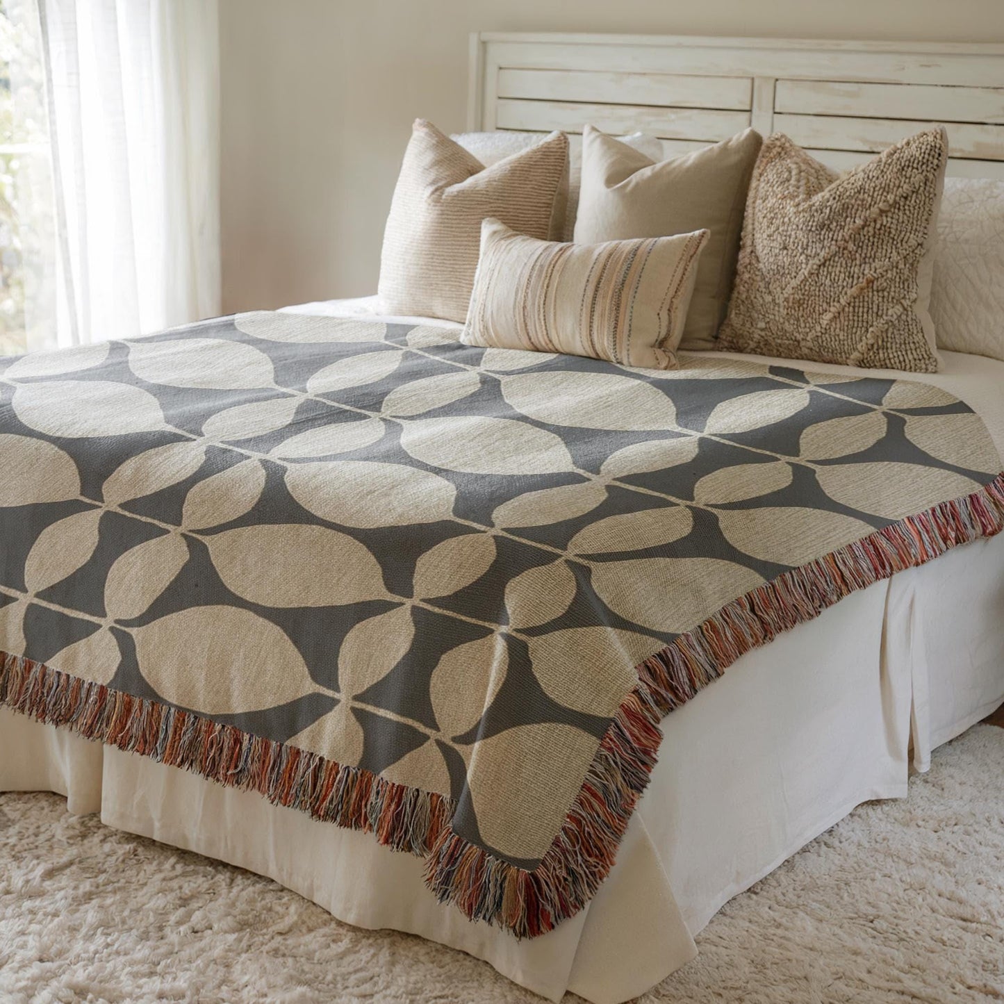 Modern Geometric woven blanket with geometric pattern styled for layered home decor