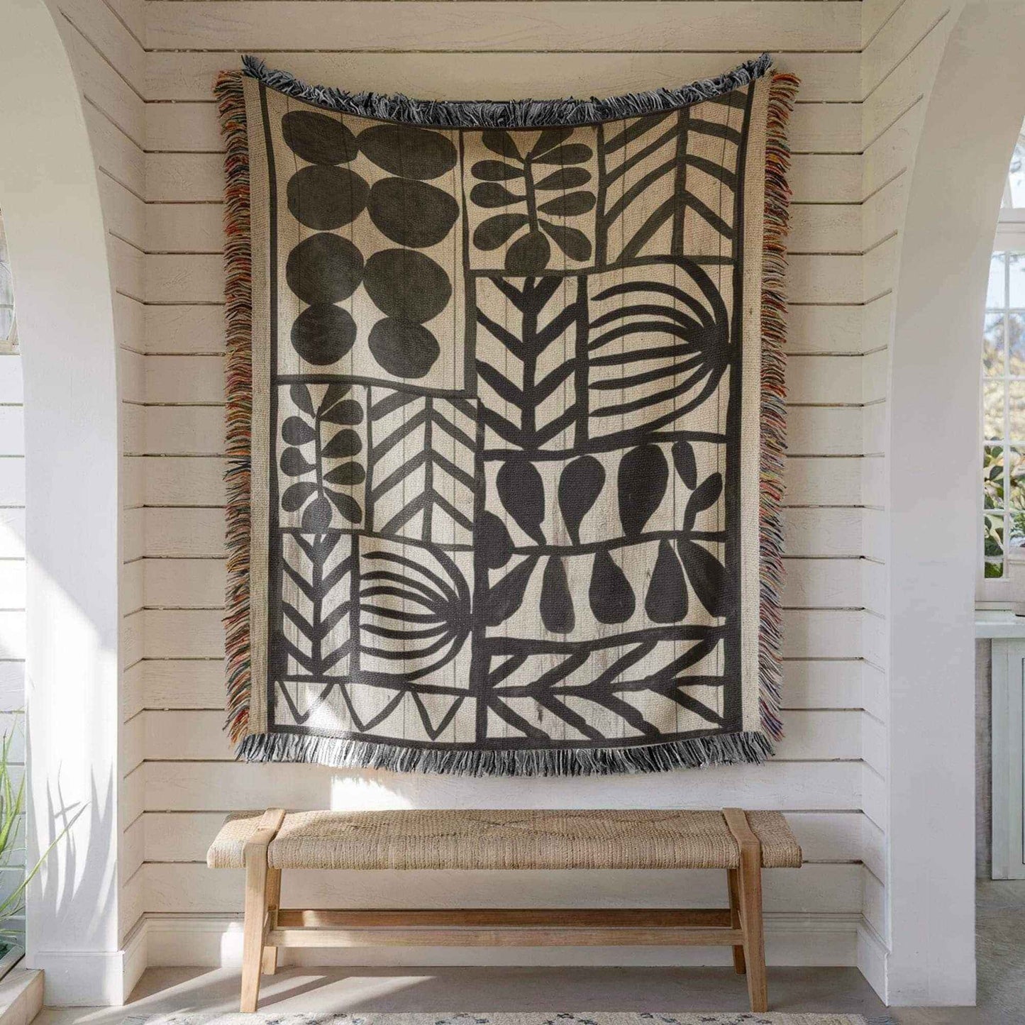 Modern Geometric woven wall tapestry with geometric pattern styled as textile wall decor