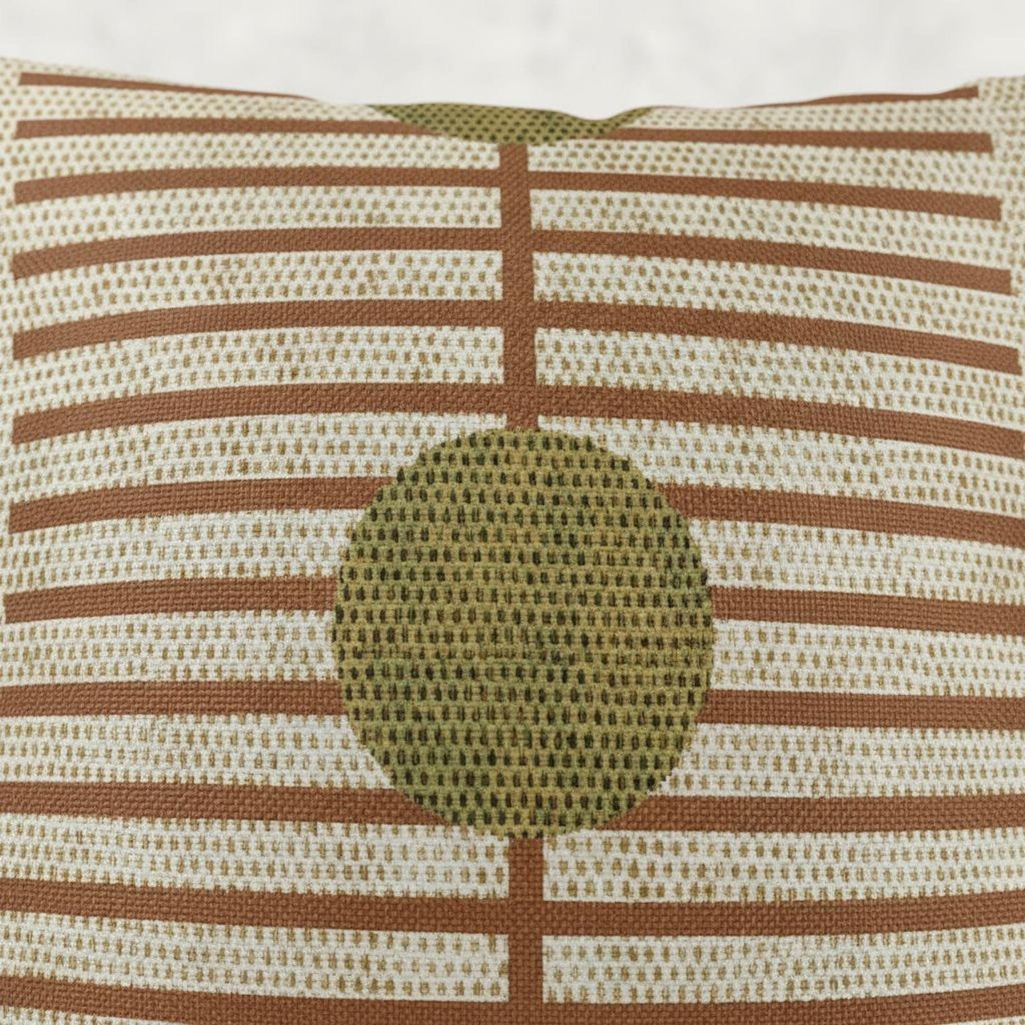 Scandinavian Inspired throw pillow with woven pattern styled on a sofa or bed