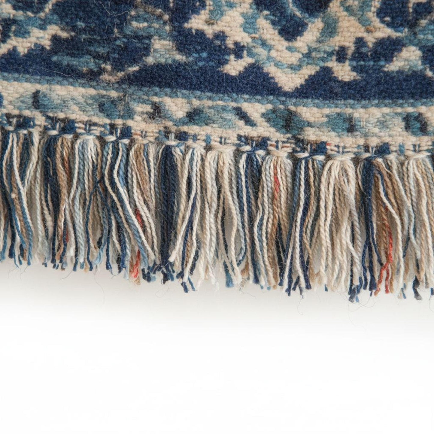 Anatolian Inspired woven blanket with rug-style pattern styled for layered home decor