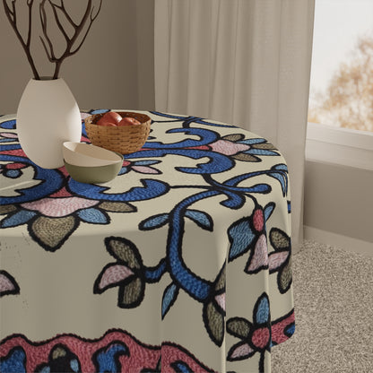 Armenian floral tablecloth with blue and pink flowering vines on cream