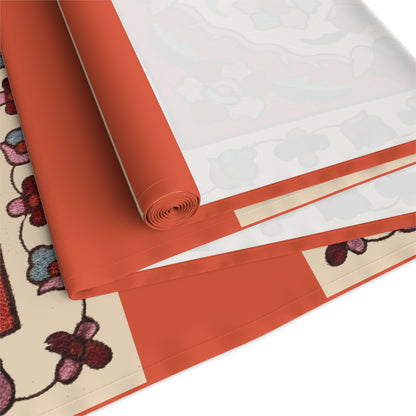 Western Armenian carpet table runner in red and cream shown on a dining table