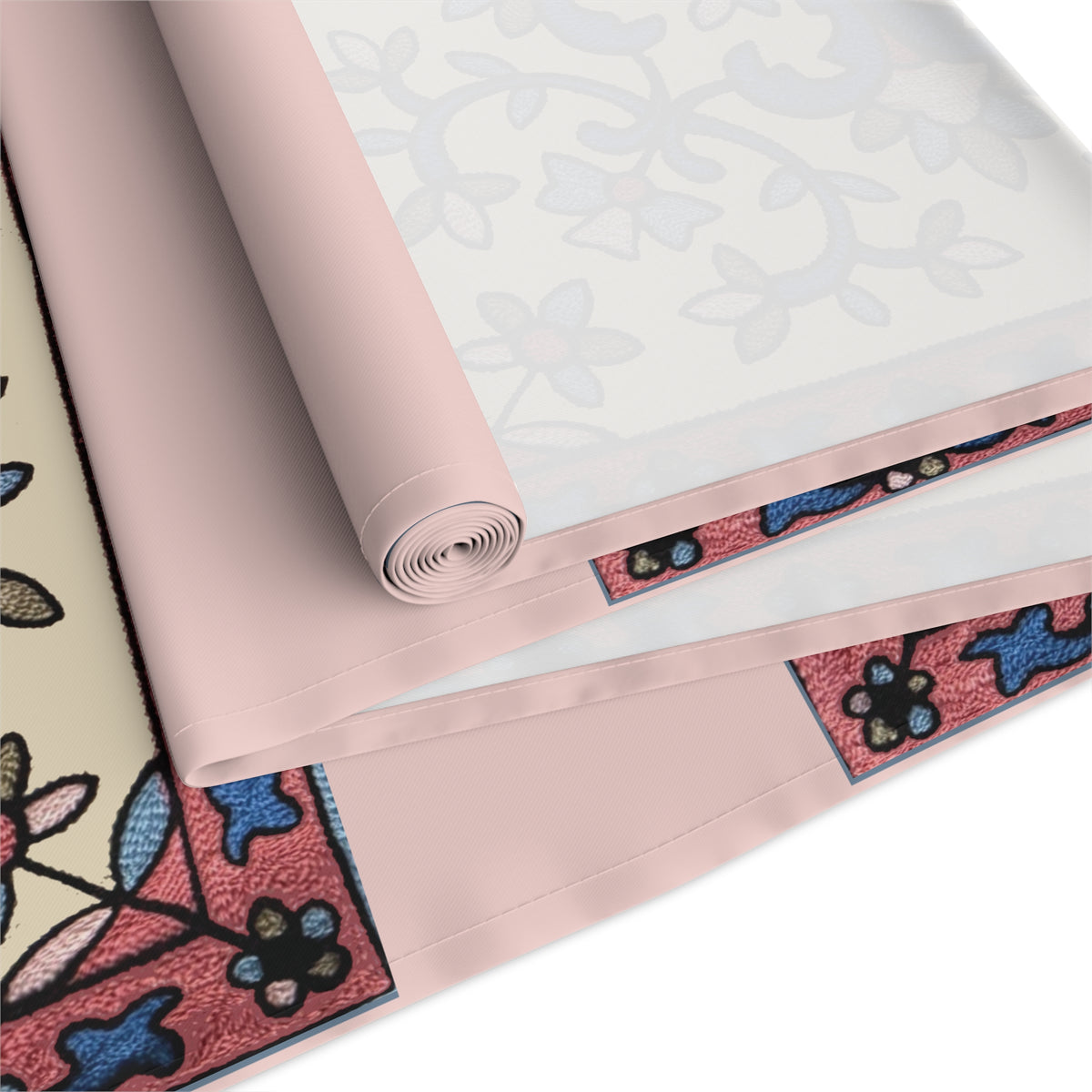 Cream Armenian floral table runner shown on a dining table