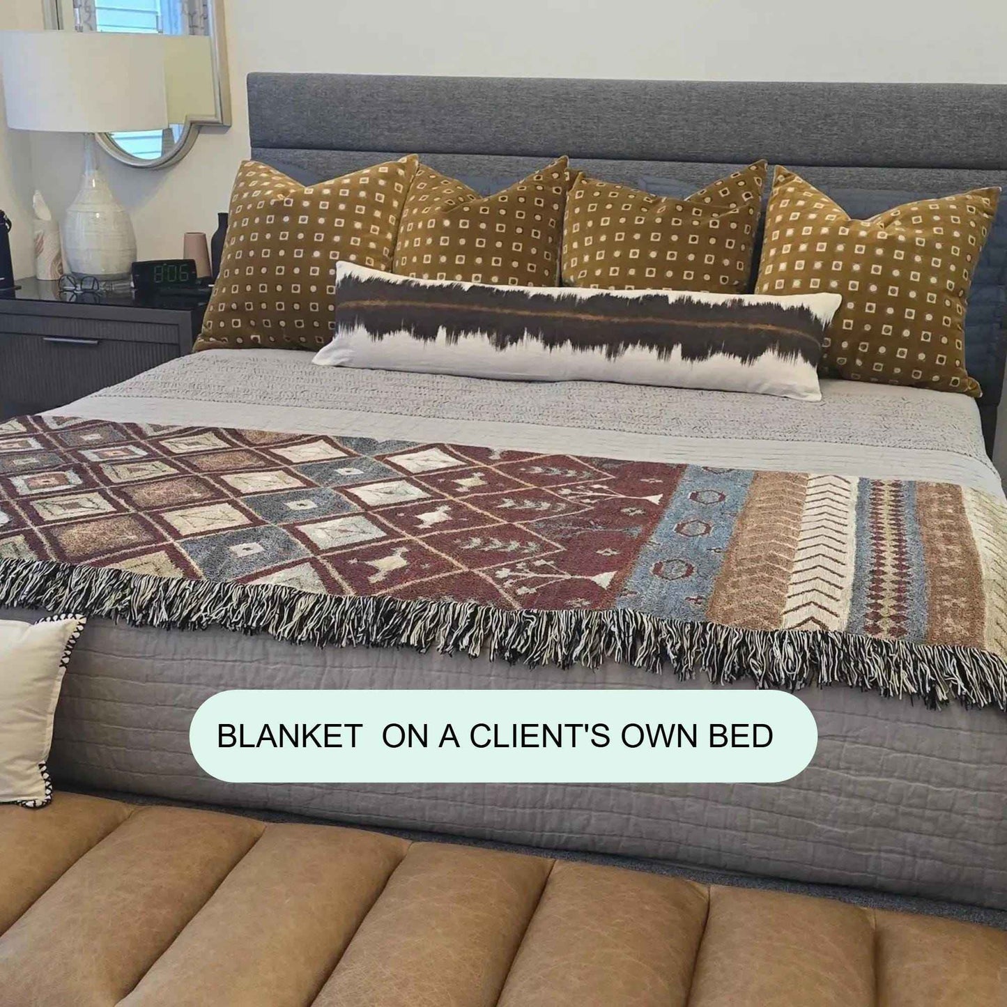 Southwestern woven blanket with geometric pattern styled for layered home decor