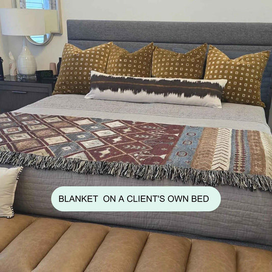 Southwestern woven blanket with geometric pattern styled for layered home decor