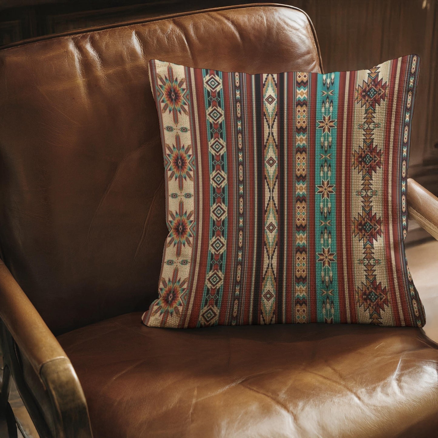 Southwestern throw pillow with geometric pattern styled on a sofa or bed