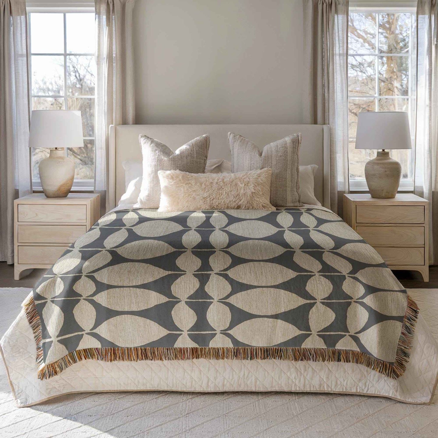 Modern Geometric woven blanket with geometric pattern styled for layered home decor