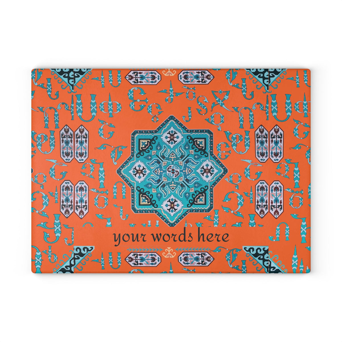 Orange and turquoise Armenian cutting board on a wooden worktop with a knife alongside