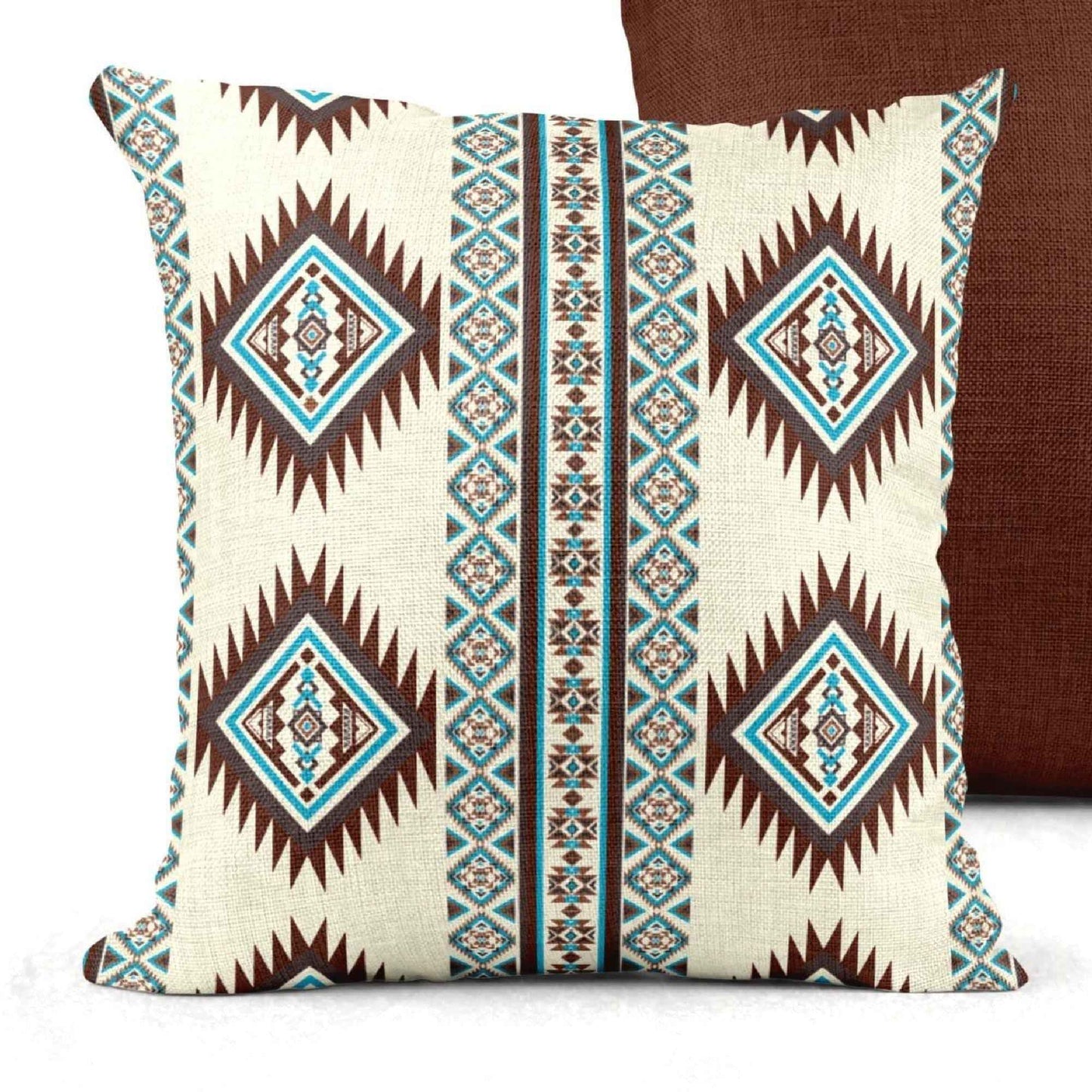 Southwestern throw pillow with geometric pattern styled on a sofa or bed