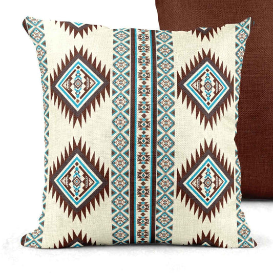 Southwestern throw pillow with geometric pattern styled on a sofa or bed