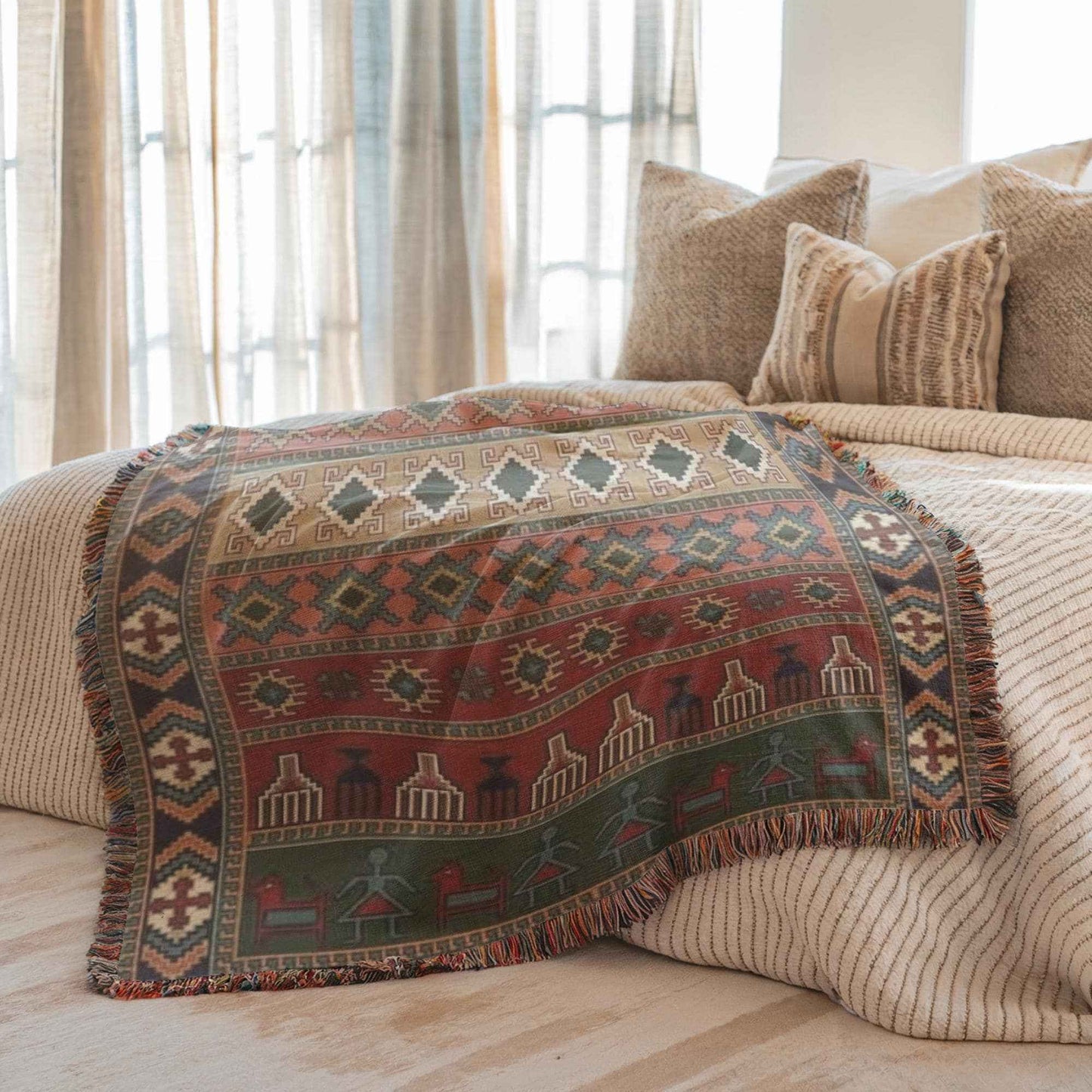 Anatolian Inspired woven blanket with rug-style pattern styled for layered home decor
