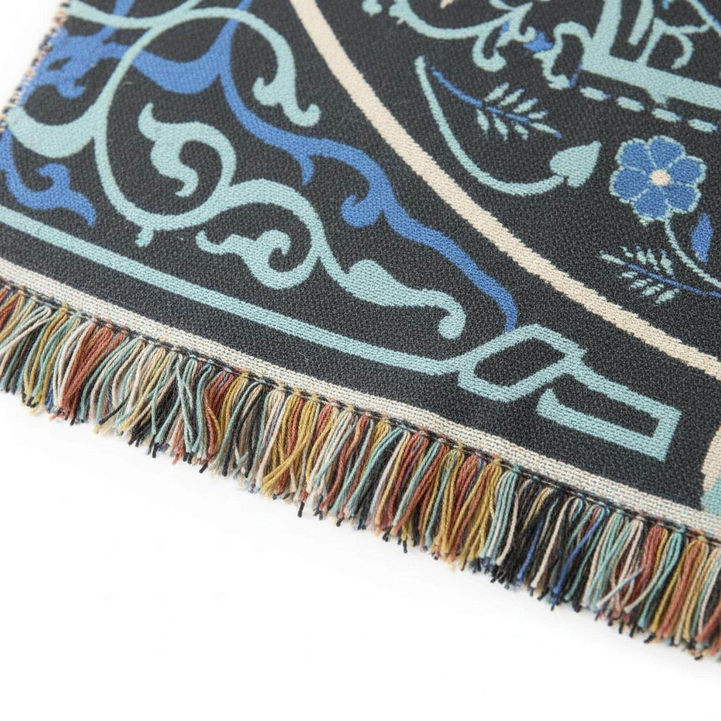 Anatolian Inspired woven blanket with rug-style pattern styled for layered home decor