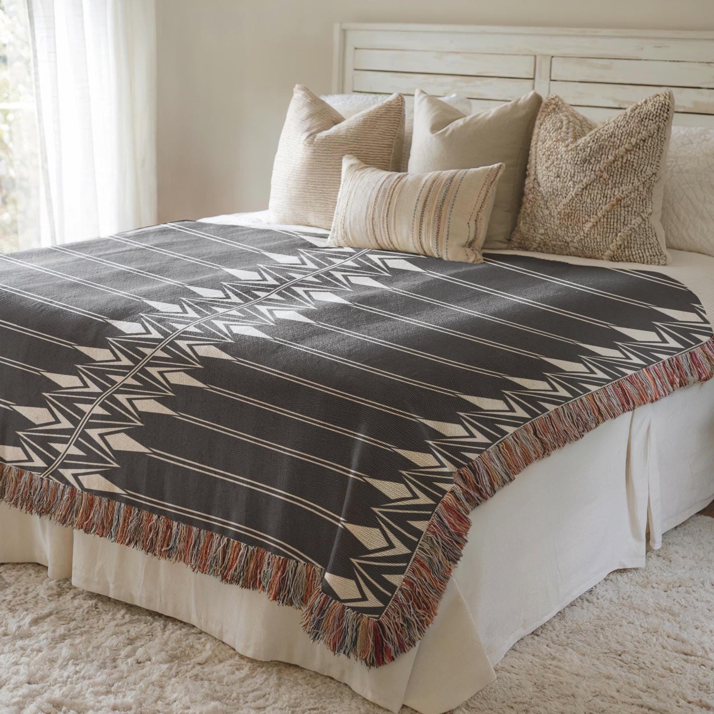 Modern Geometric woven blanket with geometric pattern styled for layered home decor