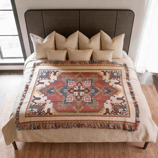 Anatolian Inspired woven blanket with rug-style pattern styled for layered home decor