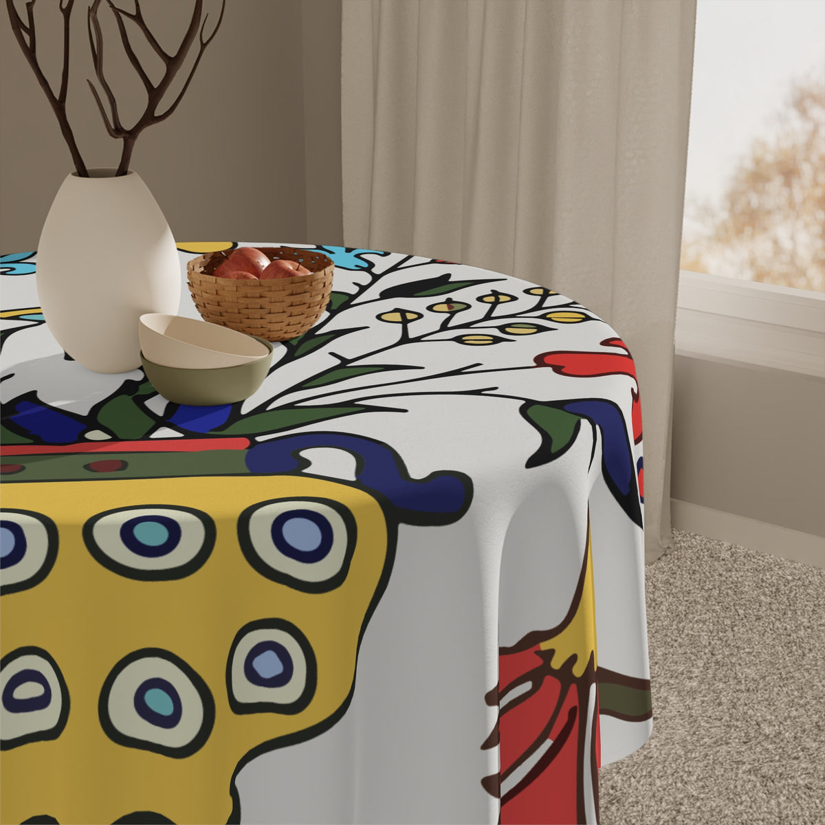 Yellow peacock tablecloth with an Armenian pottery peacock and red tulips