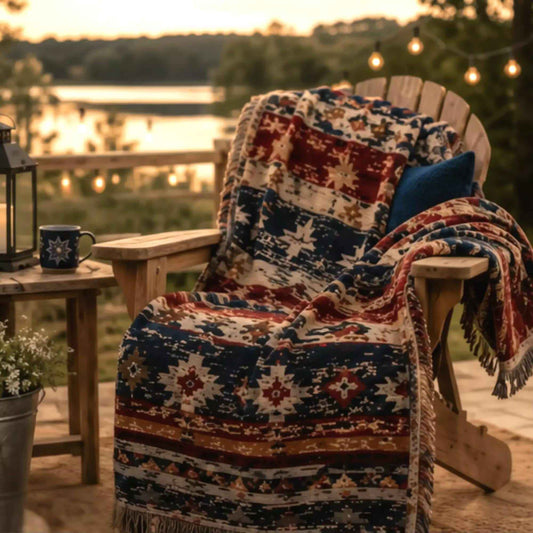 Southwestern woven blanket with geometric pattern styled for layered home decor