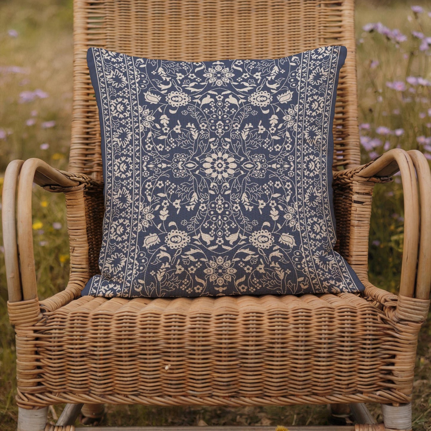 Moroccan Inspired throw pillow with floral pattern styled on a sofa or bed
