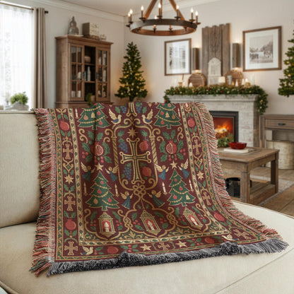 Armenian cross and Christmas tree woven blanket draped over a beige sofa in a room with festive decorations