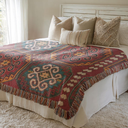 Anatolian Inspired woven blanket with rug-style pattern styled for layered home decor
