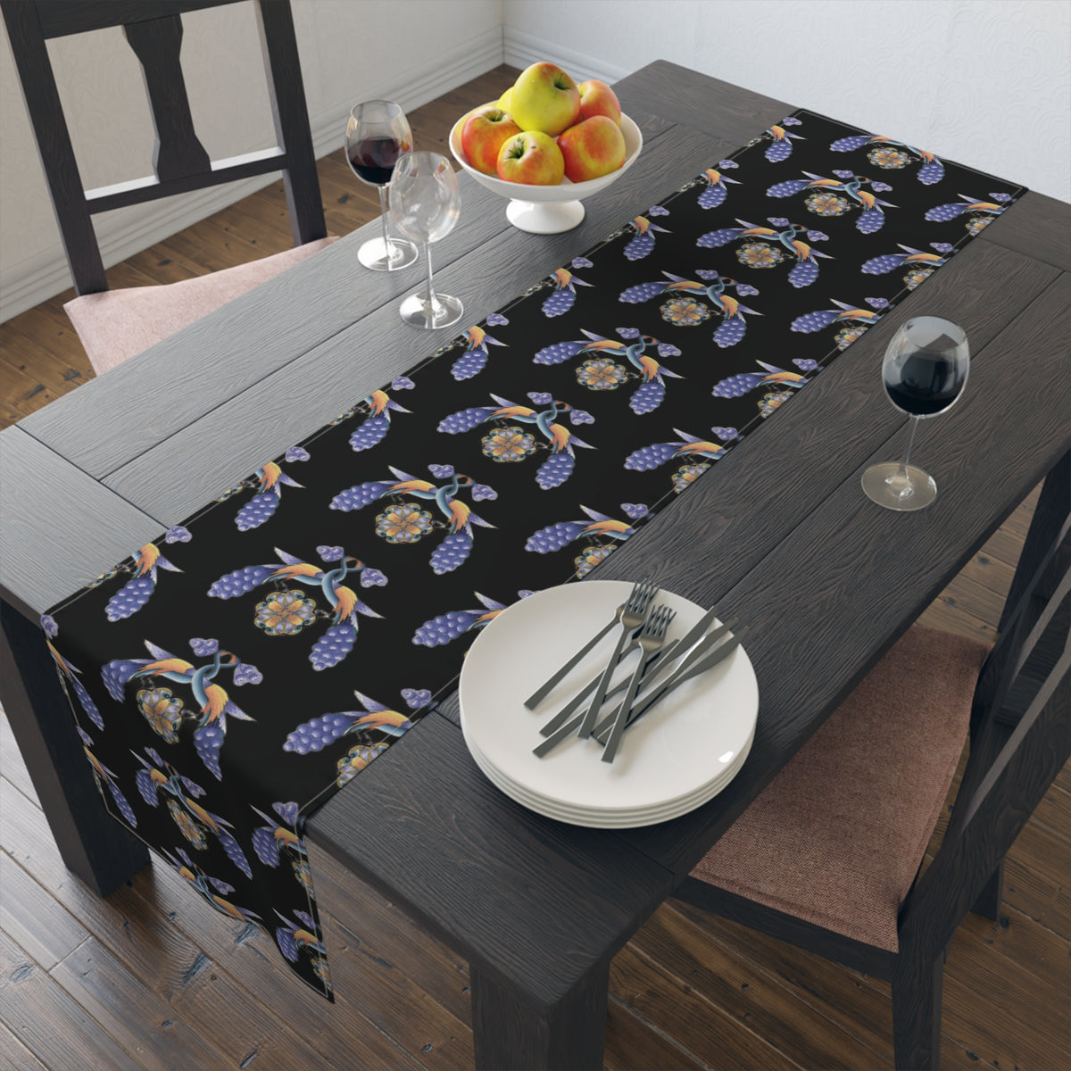 Black Armenian bird and flower table runner shown on a dining table