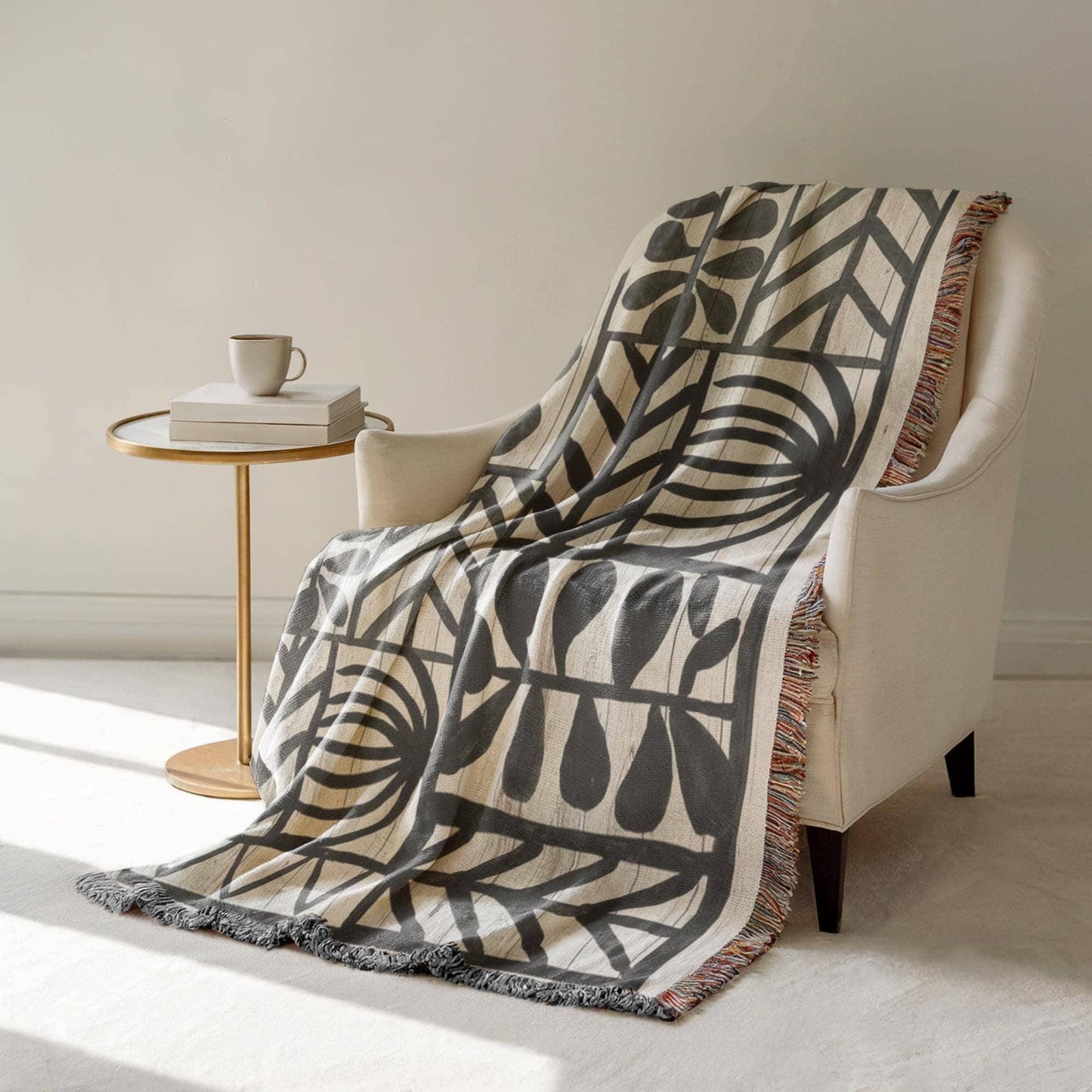 Modern Geometric woven blanket with geometric pattern styled for layered home decor