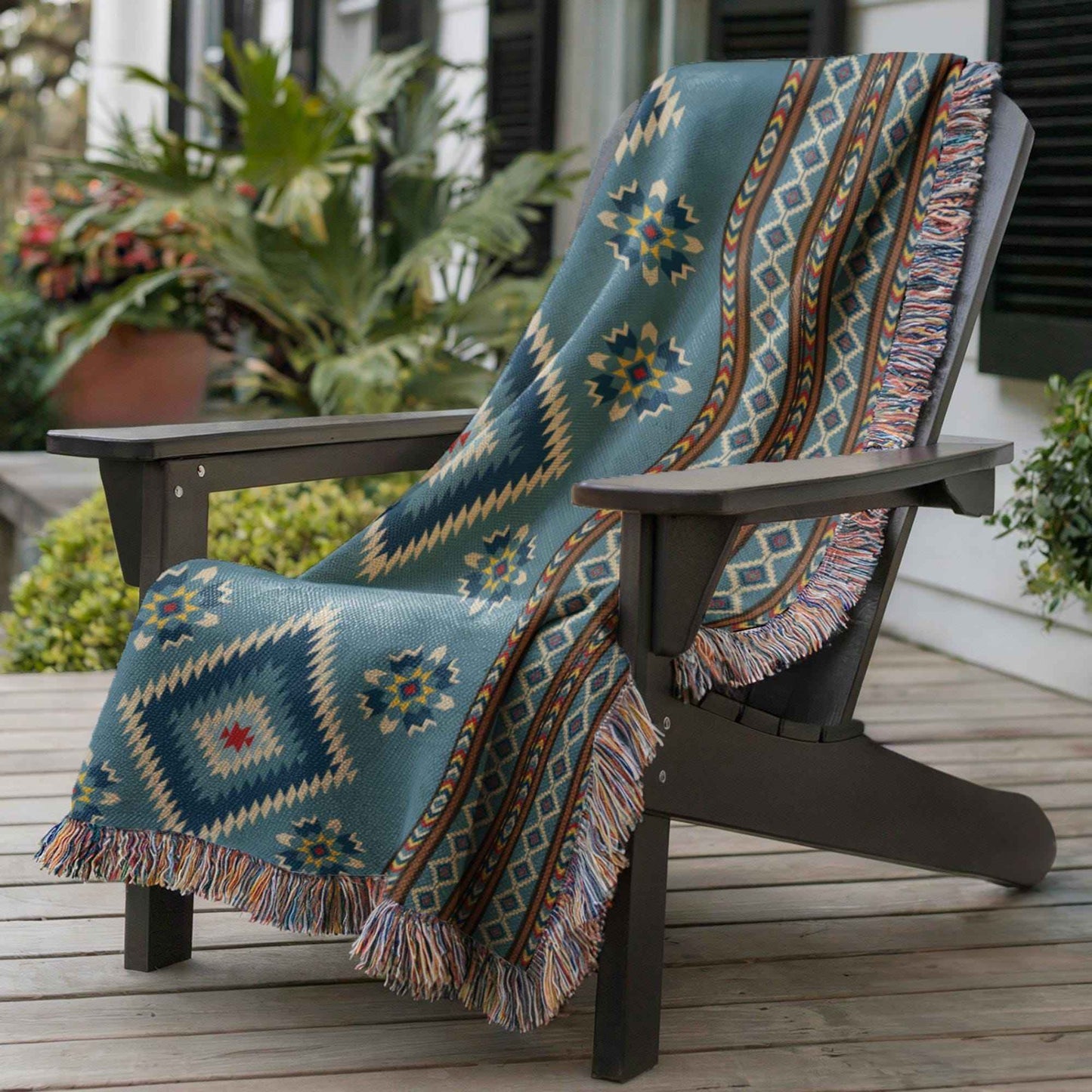 Southwestern outdoor woven throw blanket with geometric pattern for patio styling