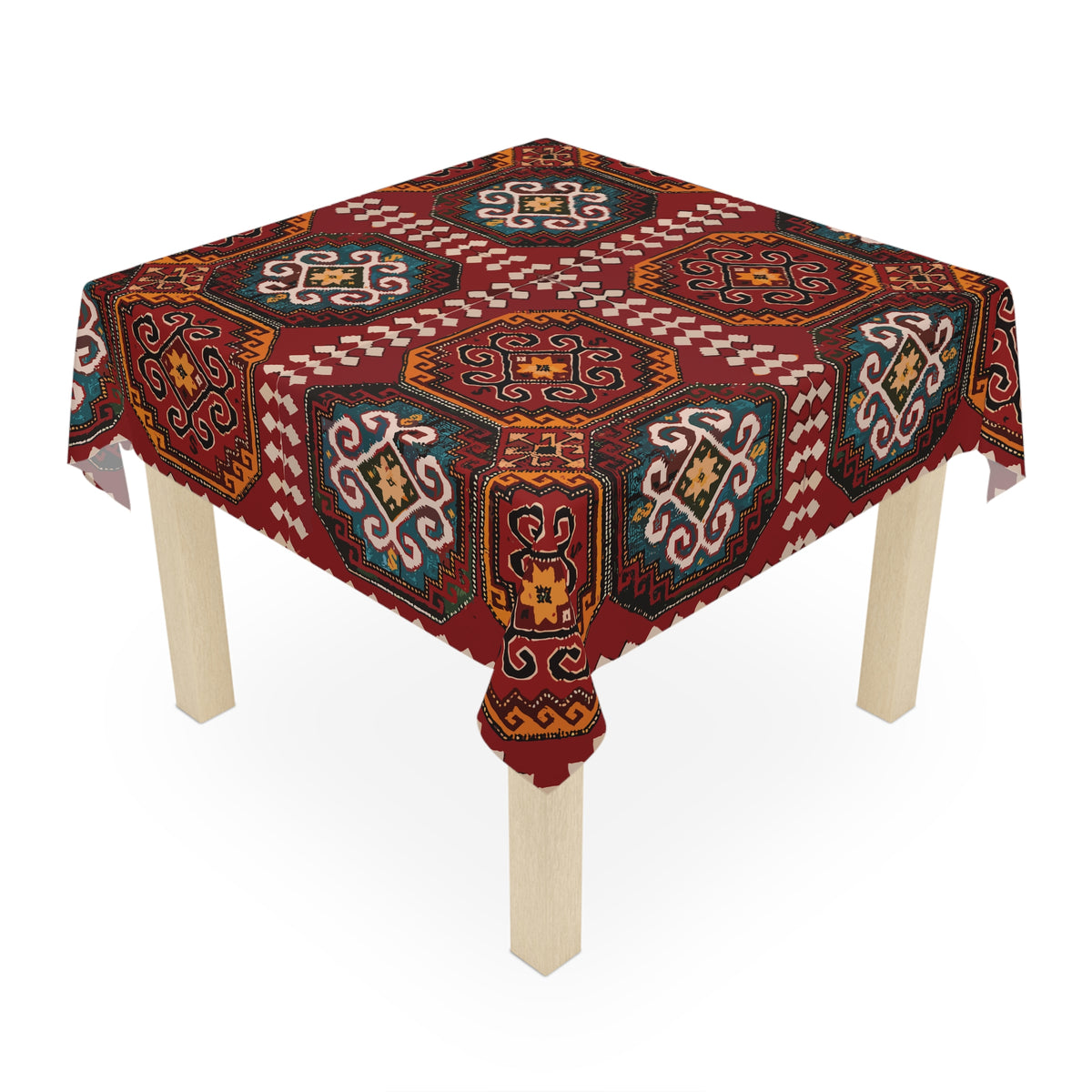 Burgundy Armenian rug design tablecloth on a round dining table with a vase and a bowl of fruit