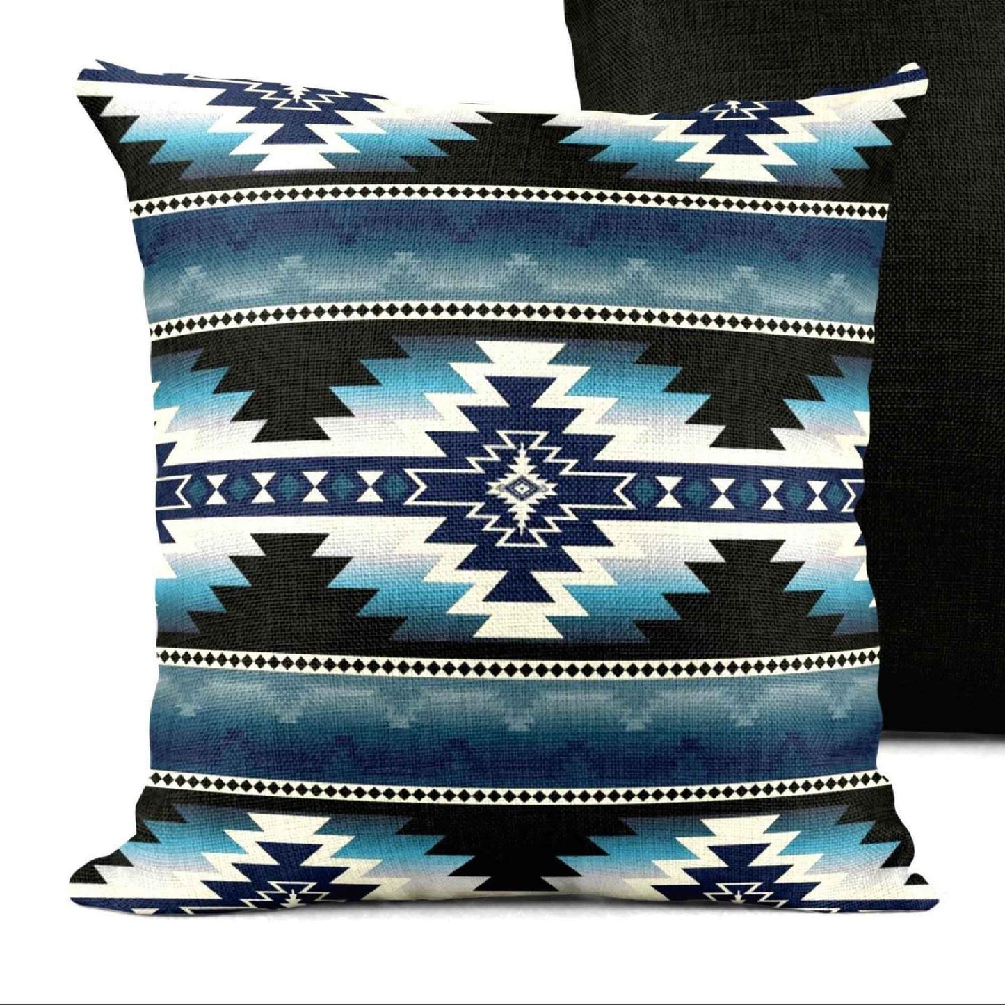 Southwestern throw pillow with geometric pattern styled on a sofa or bed