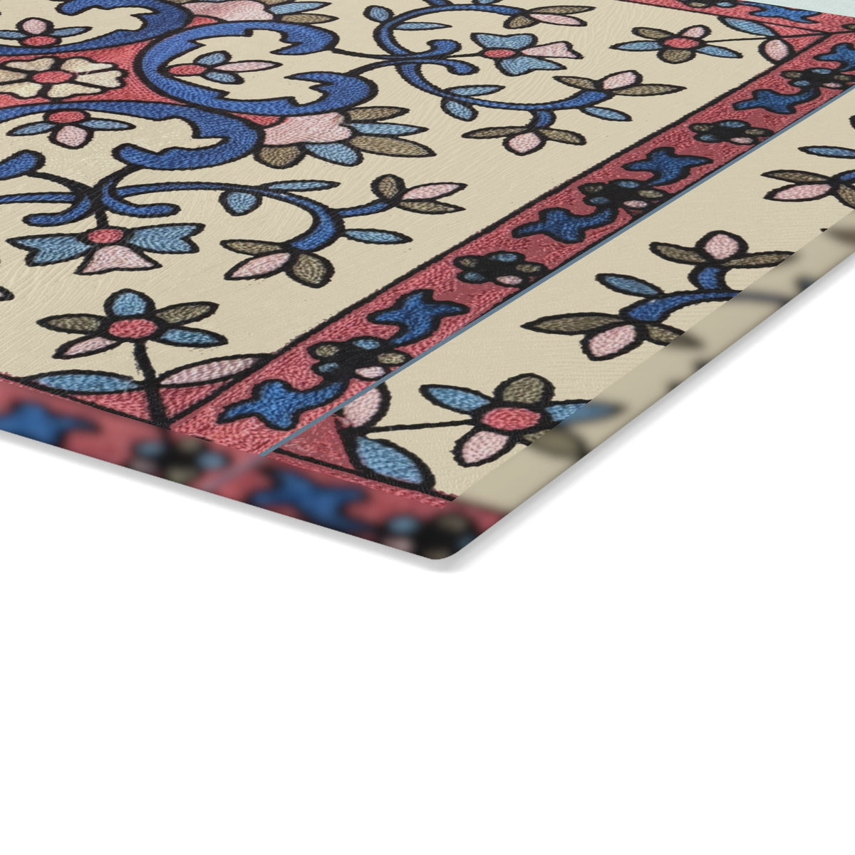 Blue and pink Armenian floral cutting board seen from above on a kitchen counter