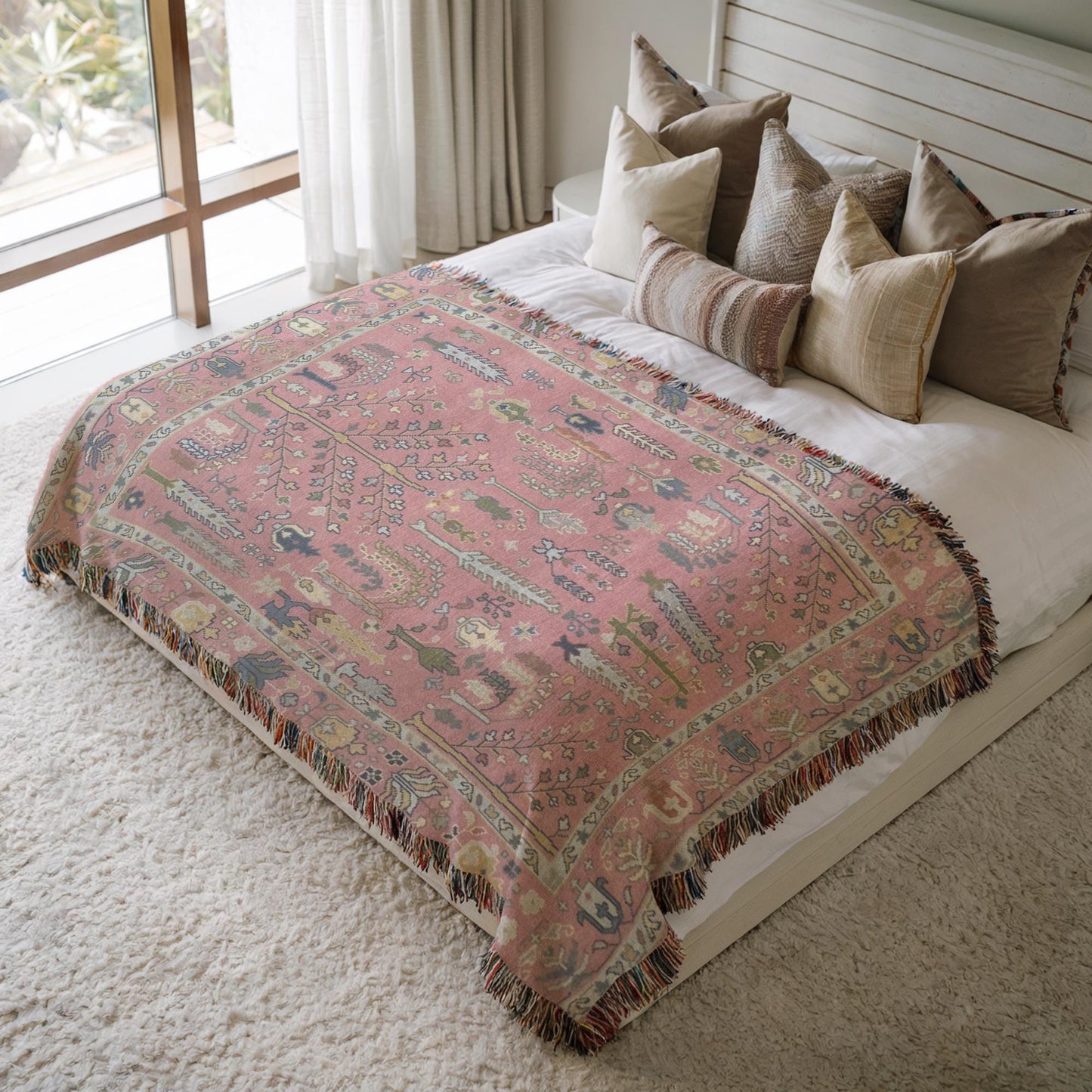 Anatolian Inspired woven blanket with rug-style pattern styled for layered home decor