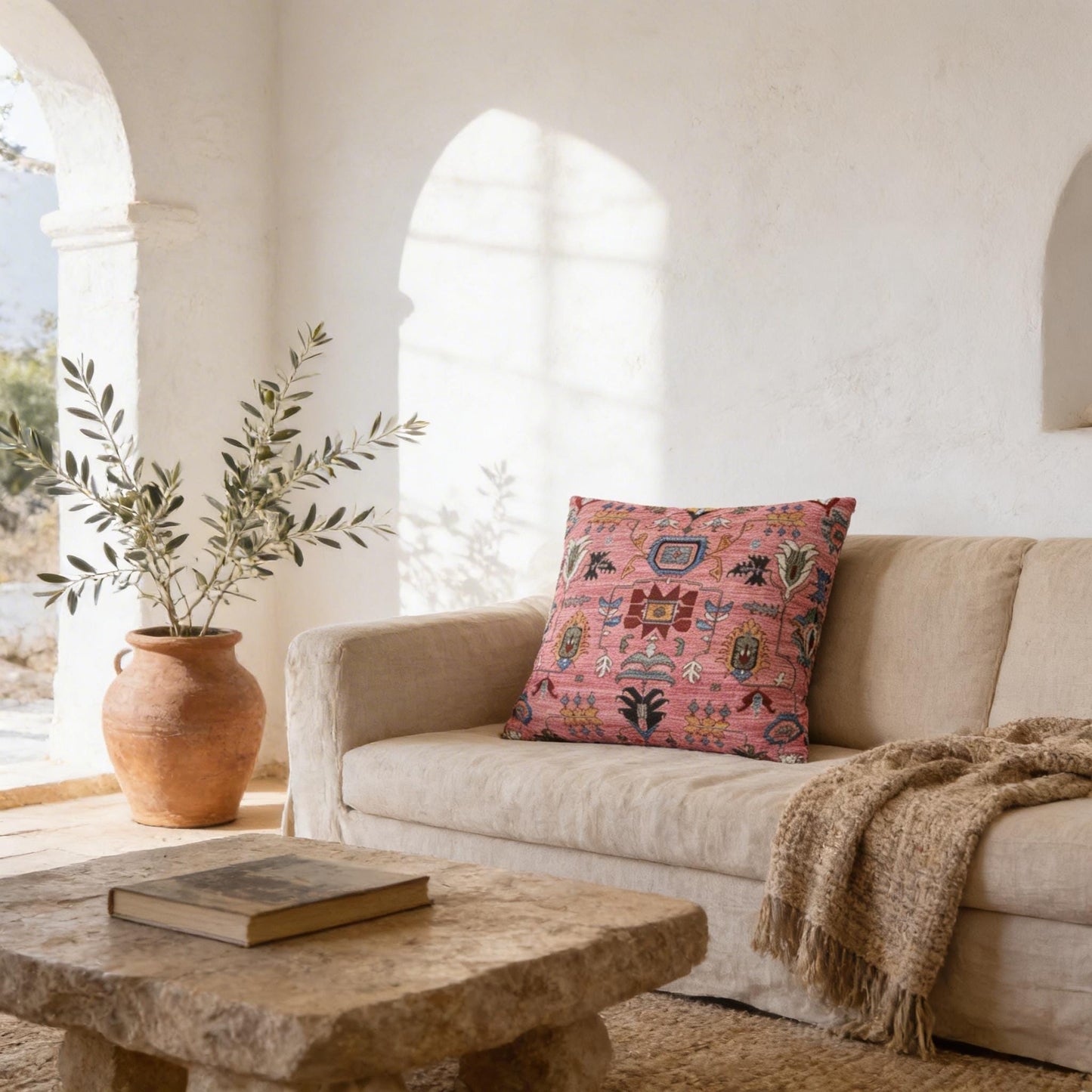 Anatolian Inspired pillow cover with rug-style pattern styled on a sofa or bed