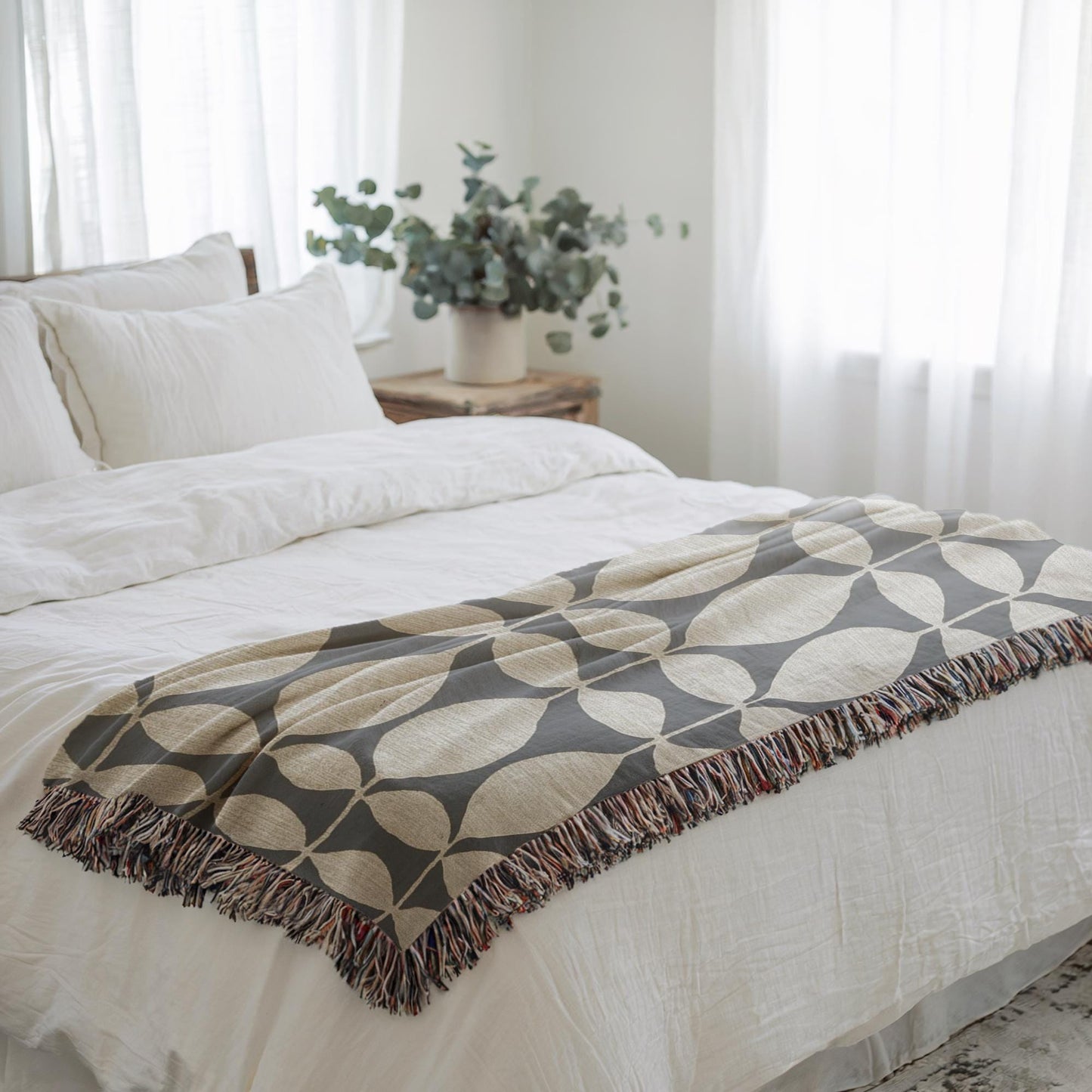 Modern Geometric woven blanket with geometric pattern styled for layered home decor