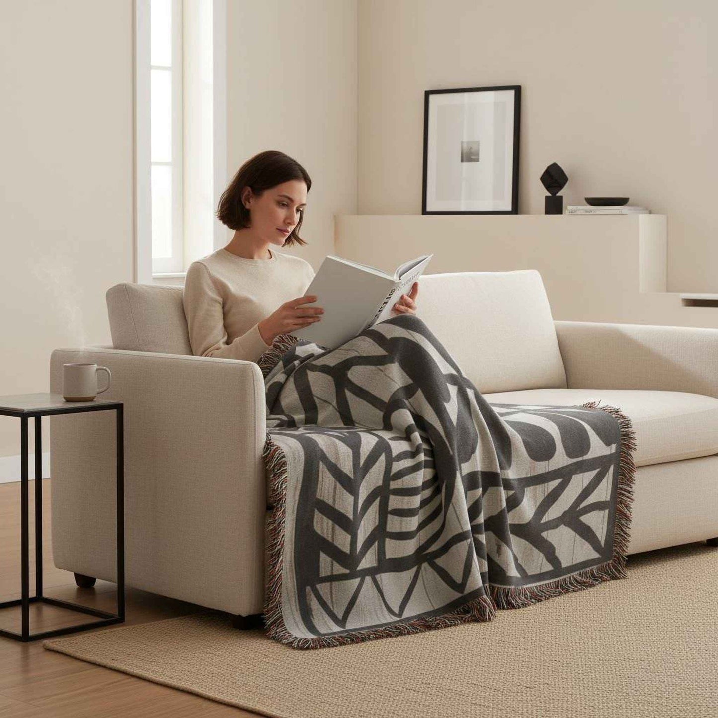 Modern Geometric woven blanket with geometric pattern styled for layered home decor