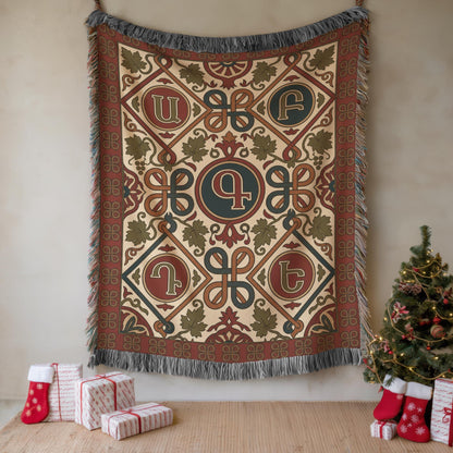 Armenian letter wall tapestry in rust and teal shown as woven cotton wall decor