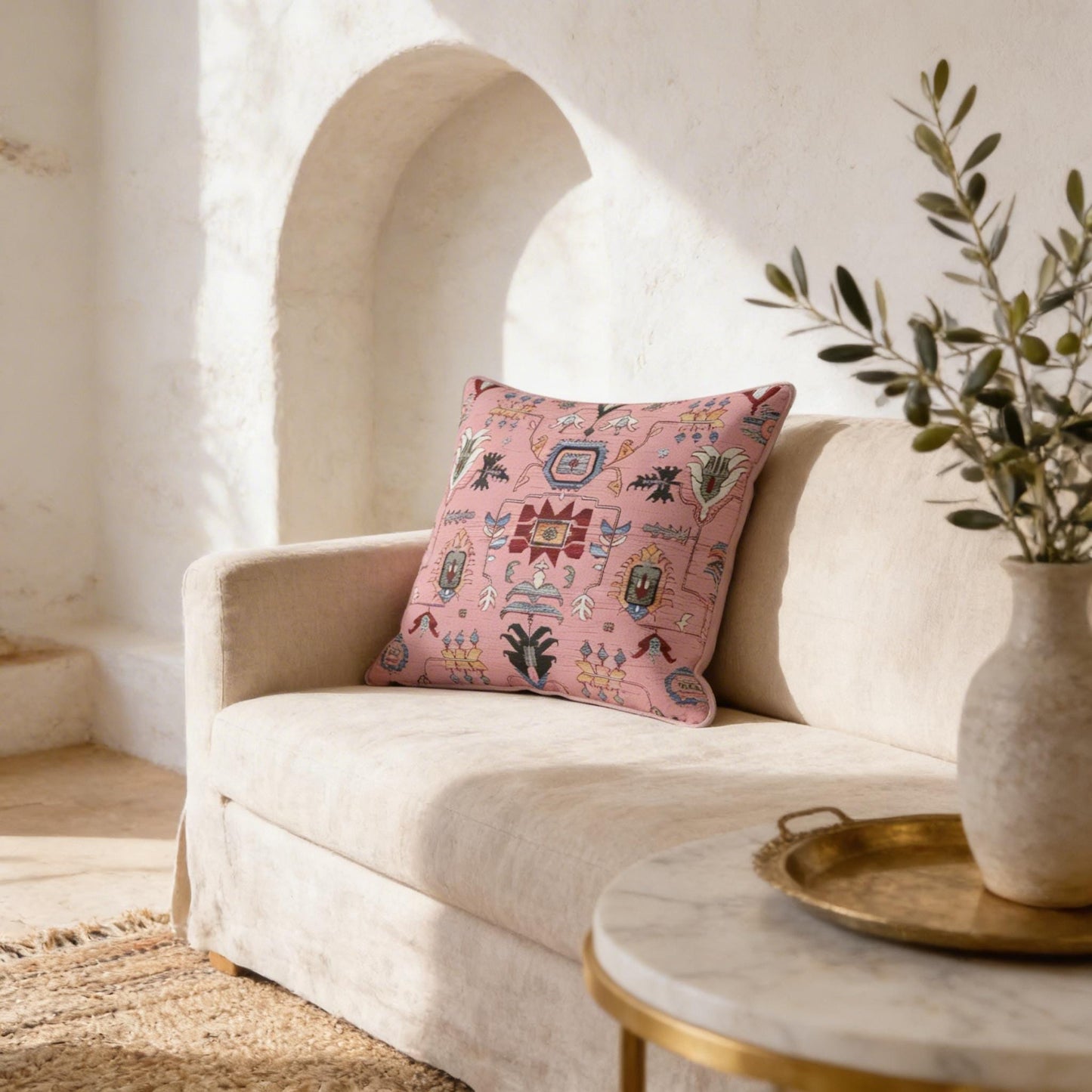 Anatolian Inspired pillow cover with rug-style pattern styled on a sofa or bed