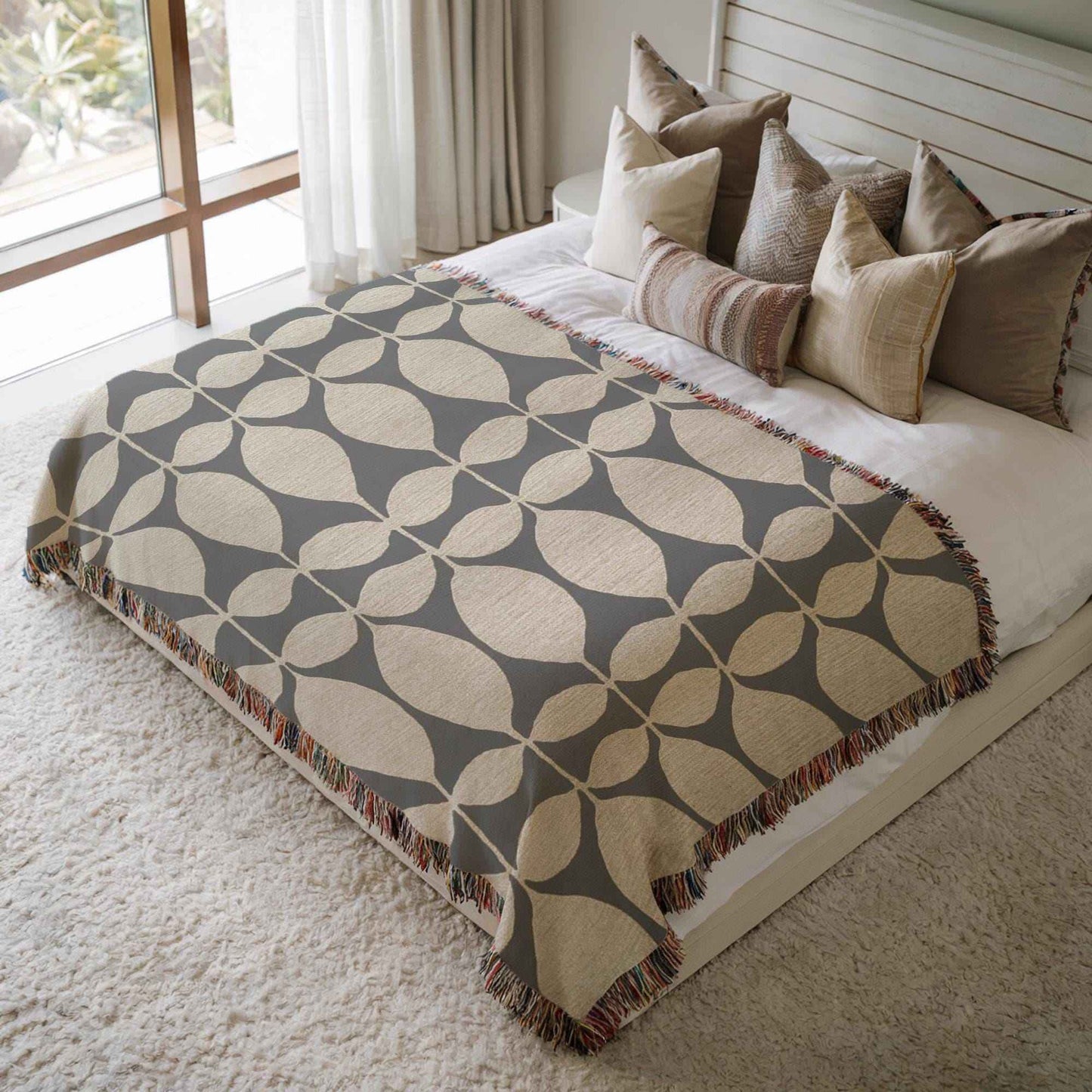 Modern Geometric woven blanket with geometric pattern styled for layered home decor