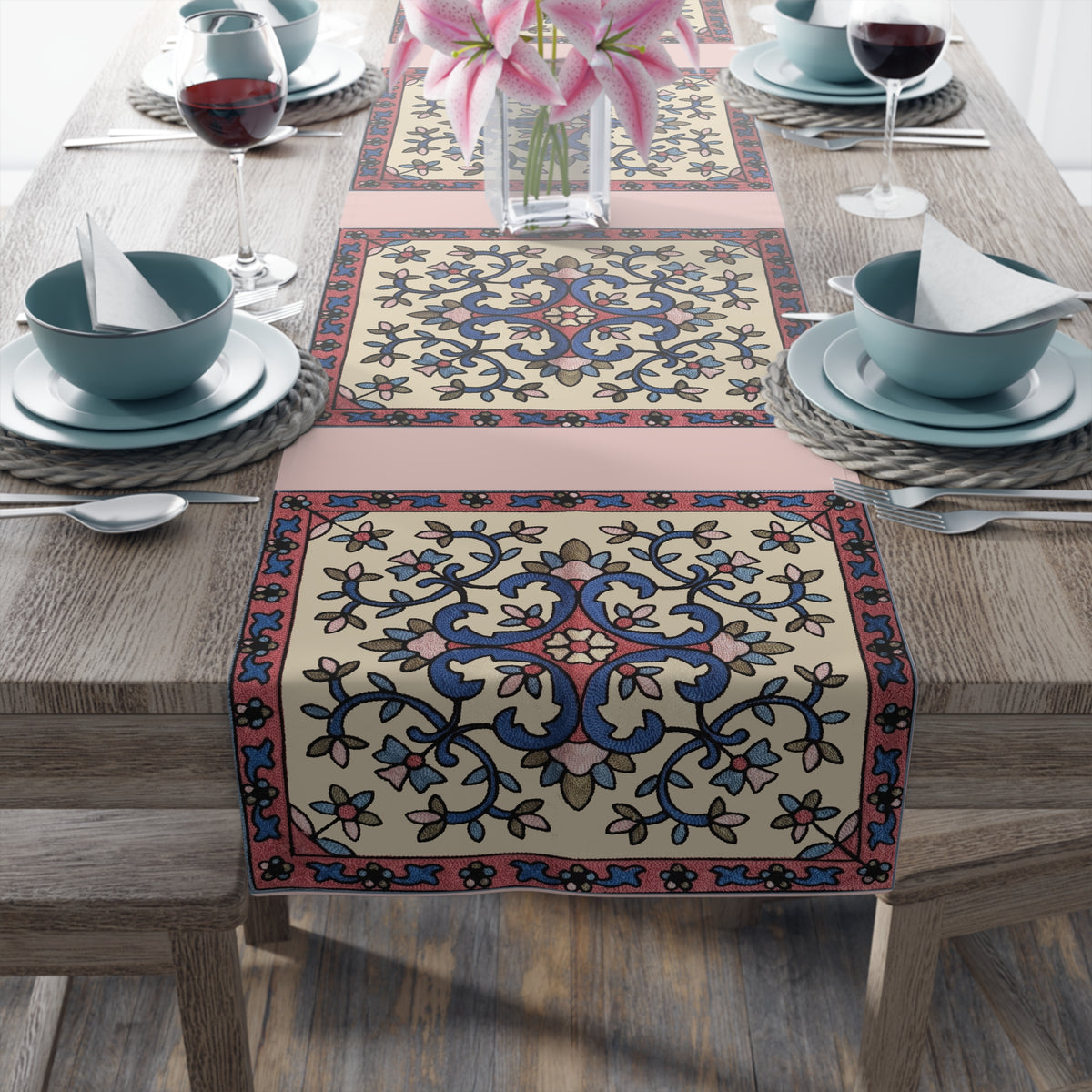 Cream Armenian floral table runner being laid on a dining table