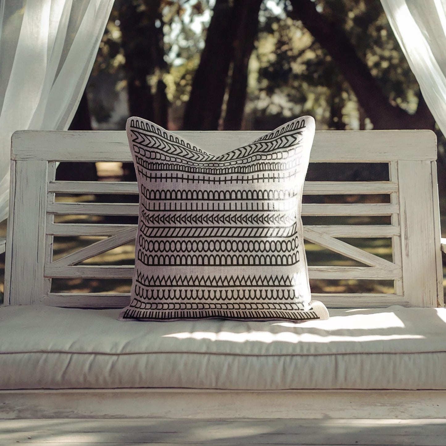 Modern Geometric throw pillow with geometric pattern styled on a sofa or bed