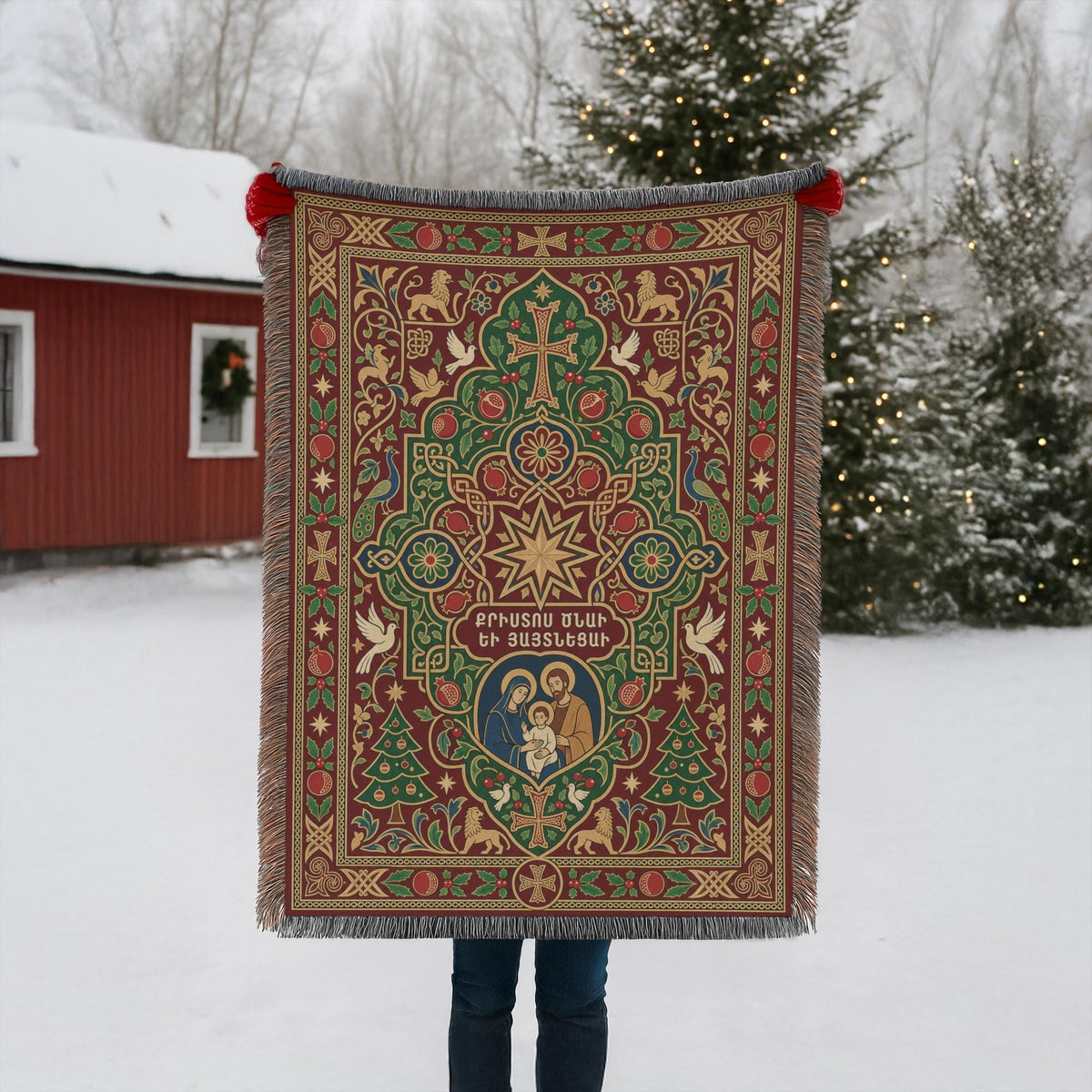 Armenian Christmas woven cotton blanket with fringe. A Nativity medallion appears beneath an eight-point star and Armenian Christmas lettering. White doves, green trees, pomegranates and an ornamental border fill the burgundy design with cream and muted gold details.