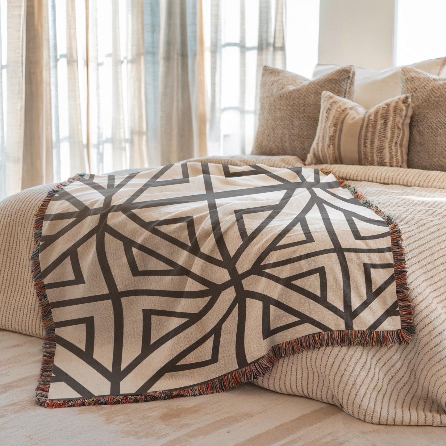 Modern Geometric woven blanket with geometric pattern styled for layered home decor