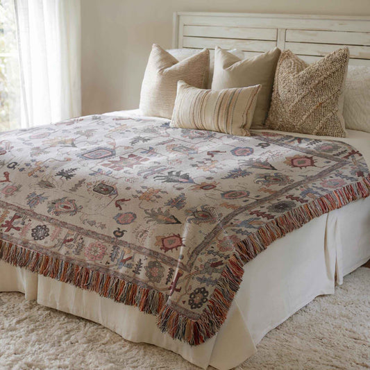 Anatolian Inspired woven blanket with rug-style pattern styled for layered home decor