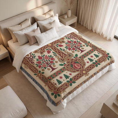 a bedroom with a large bed covered in a colorful, patterned blanket featuring a tree design. The bed is surrounded by white pillows and a white headboard. The room has a minimalist and modern design, with a white color scheme and a wooden floor.