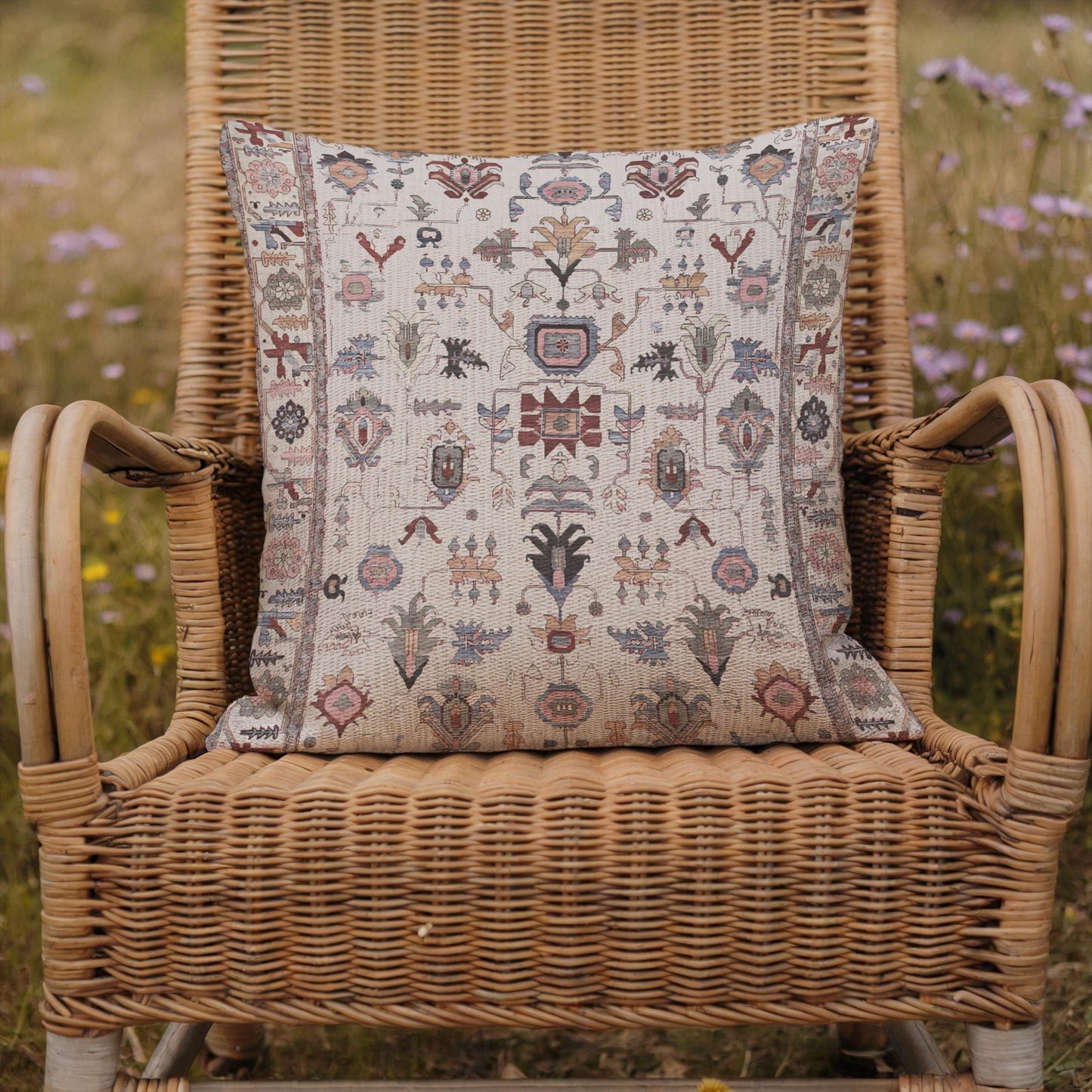 Anatolian Inspired pillow cover with rug-style pattern styled on a sofa or bed