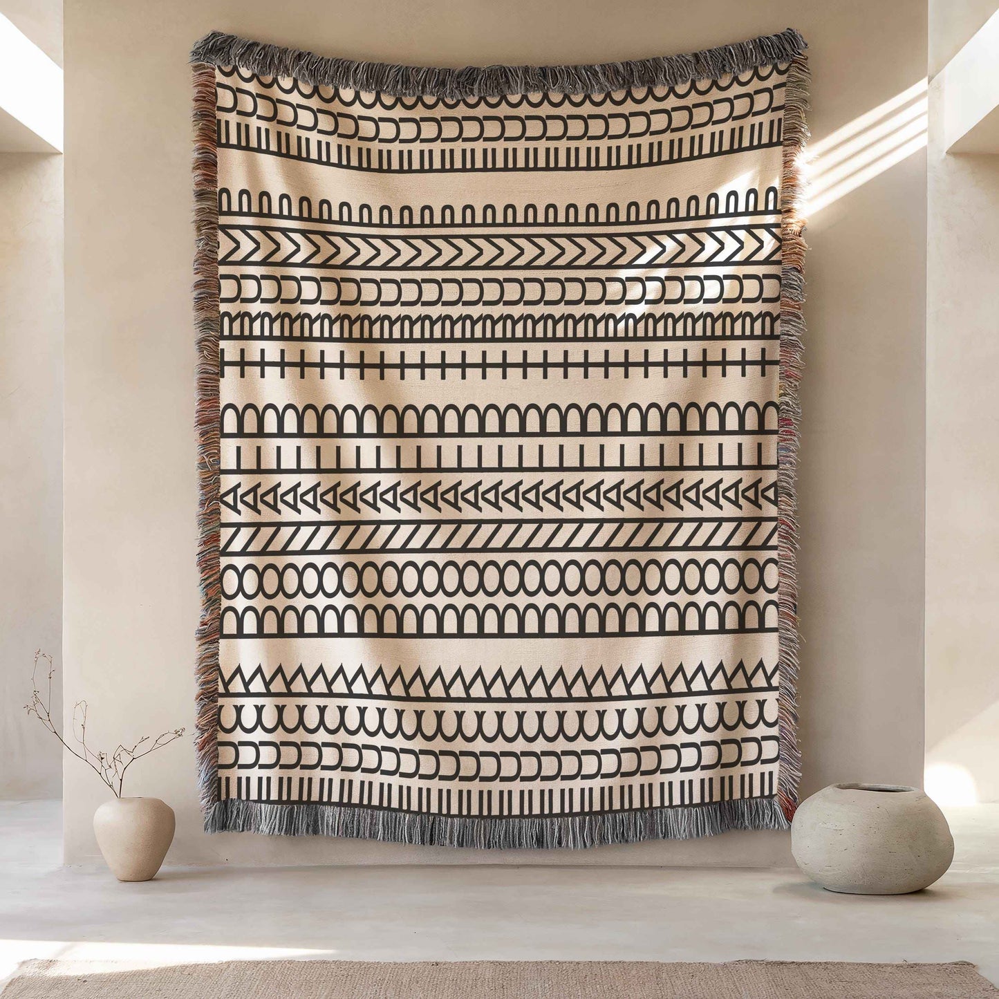 Modern Geometric woven blanket with geometric pattern styled for layered home decor