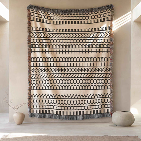 Modern Geometric woven blanket with geometric pattern styled for layered home decor